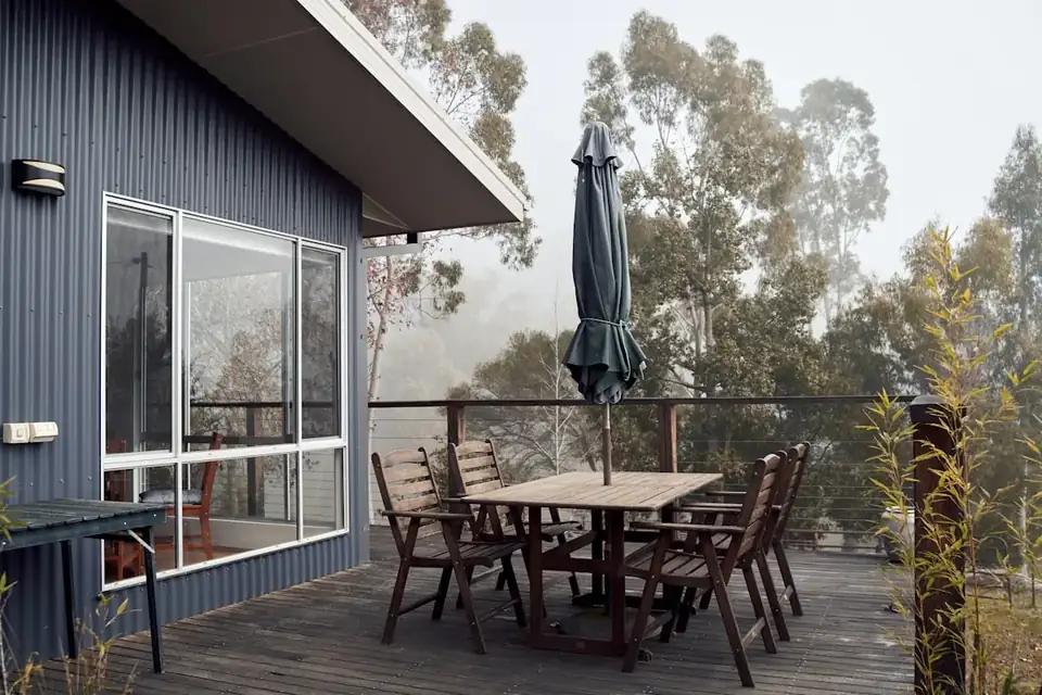 An outdoor table on a timber deck