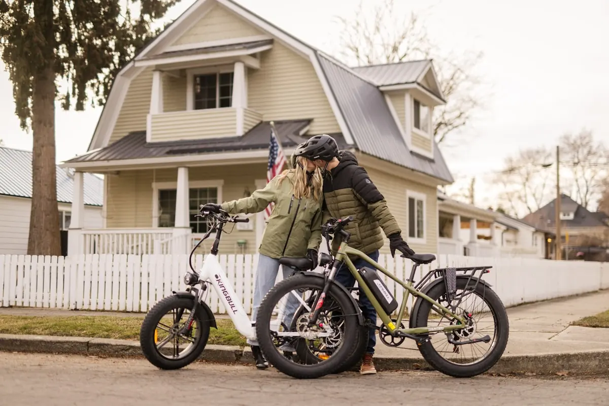 A family with their bikes outside their home