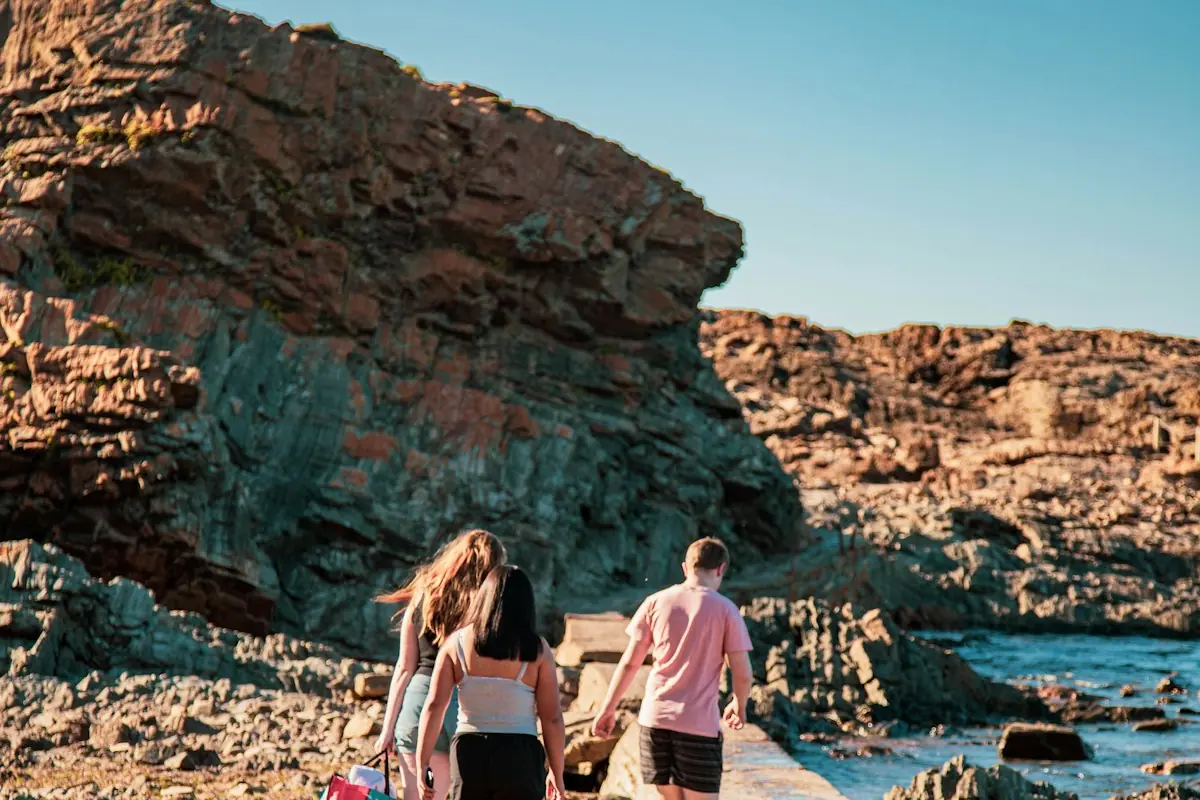 A family exploring rock pools