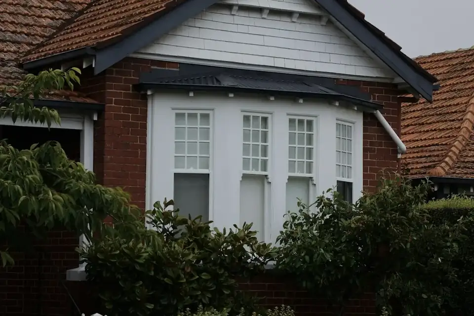 A brick house with a gabled roof