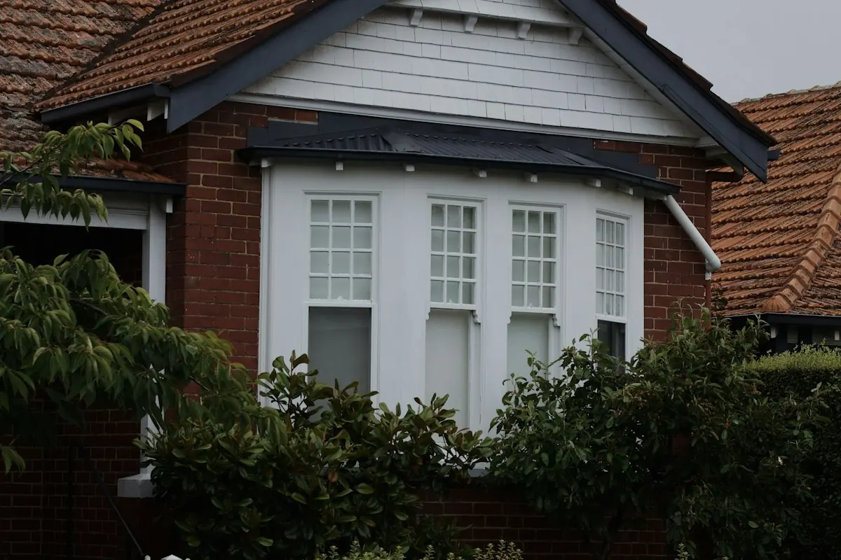 A brick house with a gabled roof