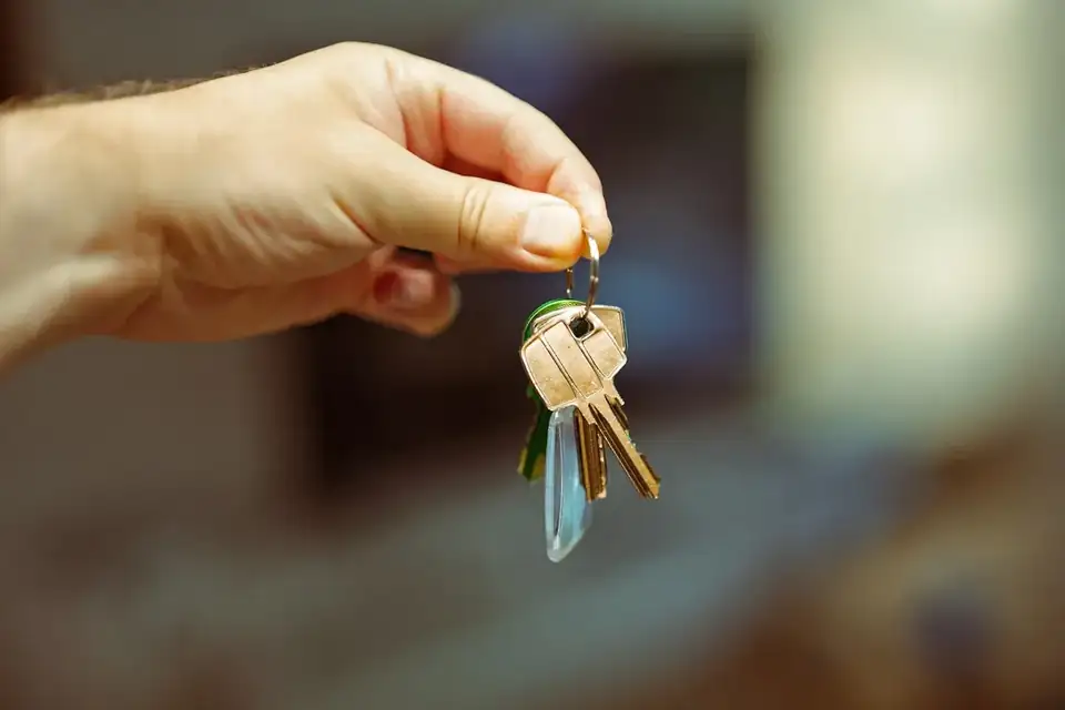 Keys being handed over at settlement