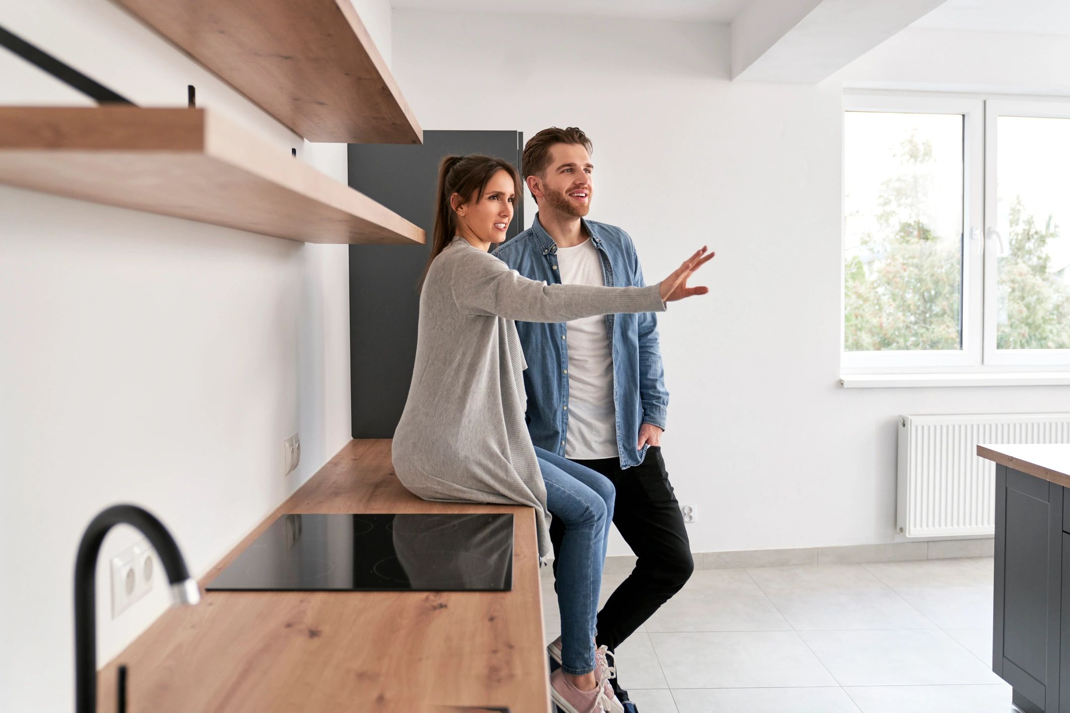 First home buyer couple planning their new home purchase